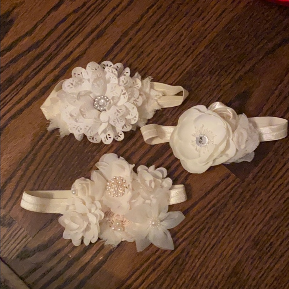 Lot of ivory infant headbands